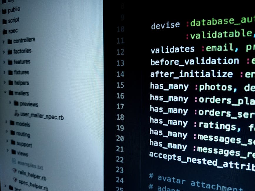 A person’s hands are positioned on a laptop keyboard, with visible fingernails and veined skin. The laptop screen displays lines of code in a dark-themed interface, featuring syntax highlighted in g